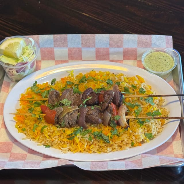 Beef Bihari Over Biryani Rice.